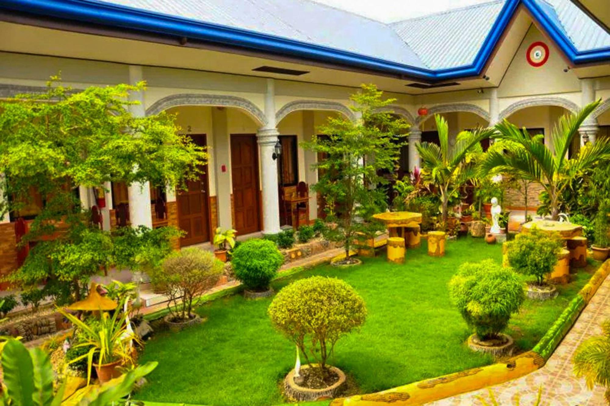 Mbg Travellers Inn Powered By Cocotel Puerto Princesa Kültér fotó